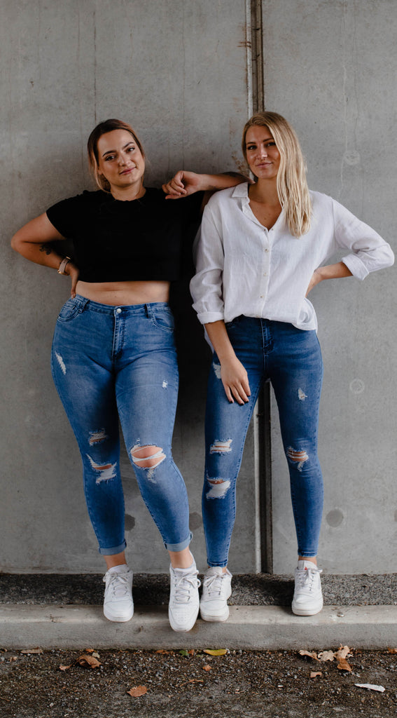 ripped blue skinny jean