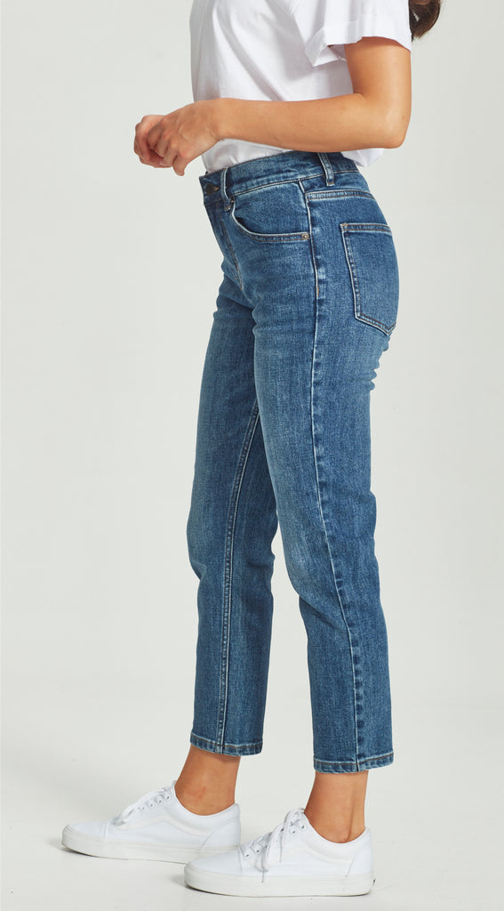 mid waisted straight leg short length dark blue jean